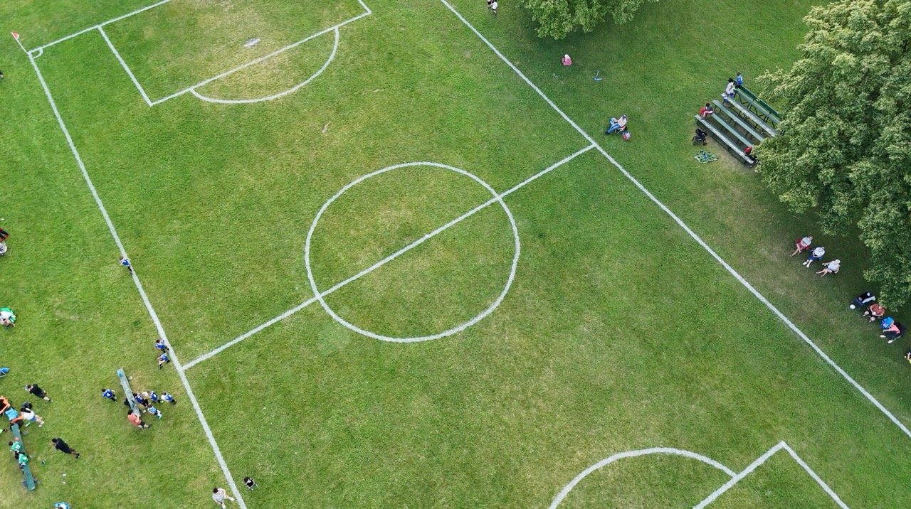 Wide aerial shot of a park and waterway