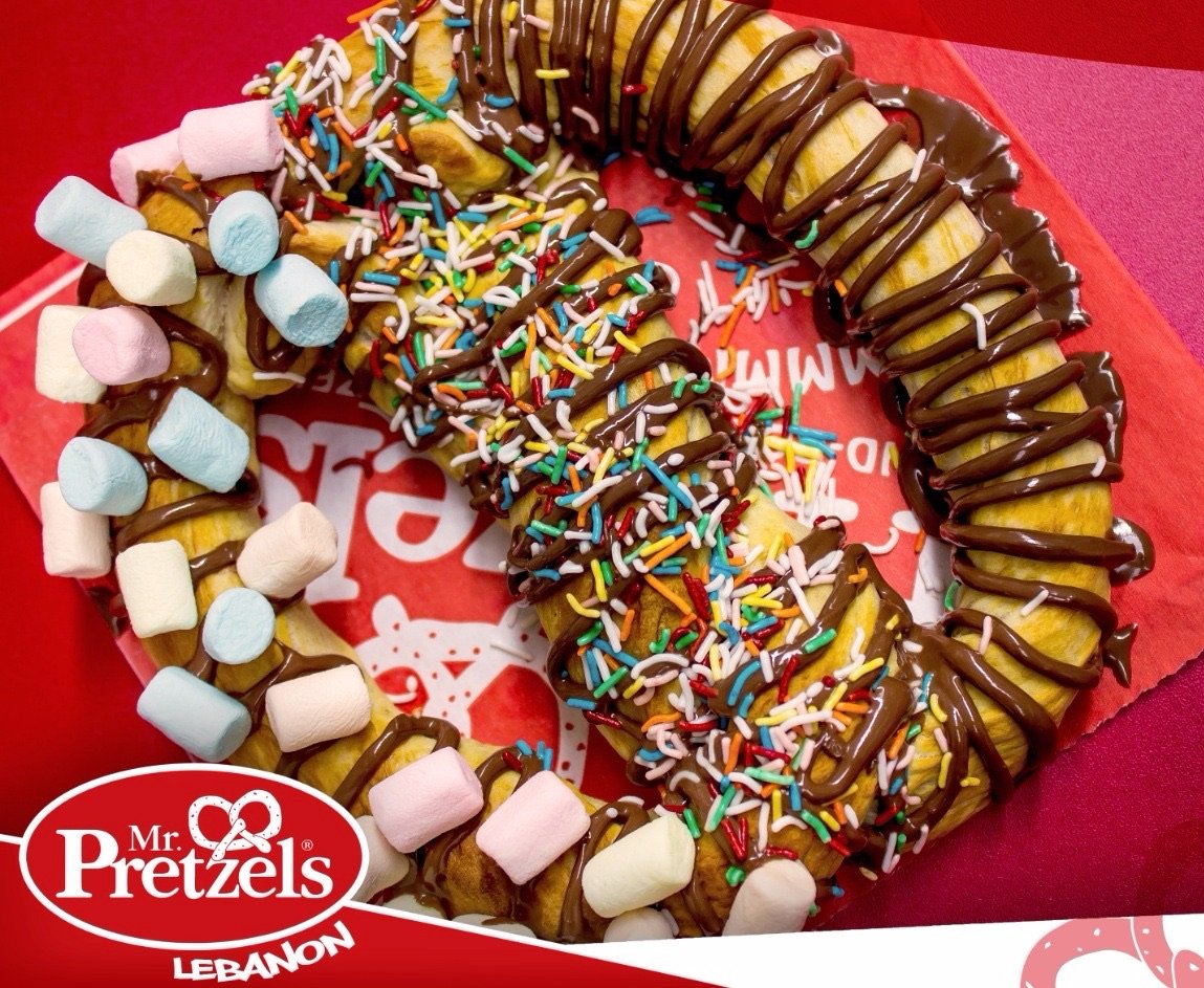 A pretzel with chocolate and marshmallows